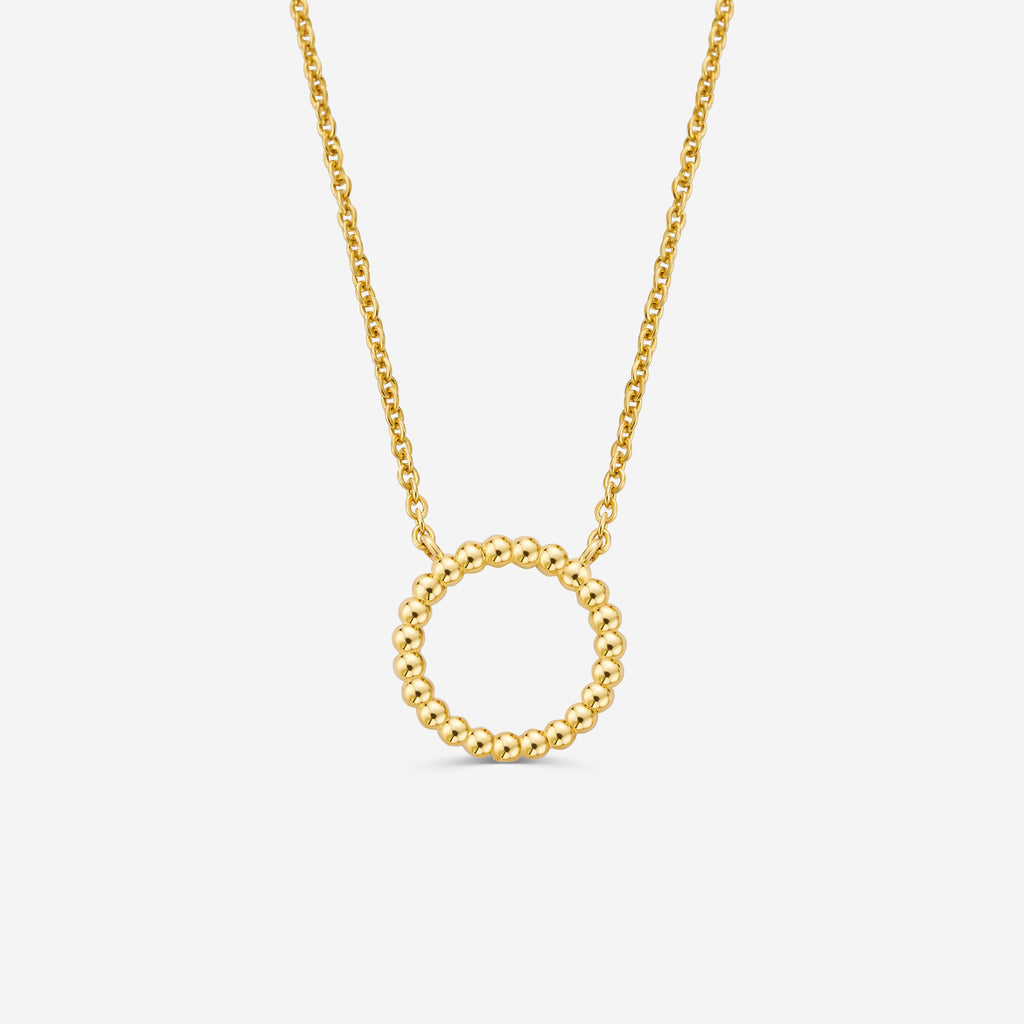 14ct gold necklace with a circular beaded pendant on a off white background
