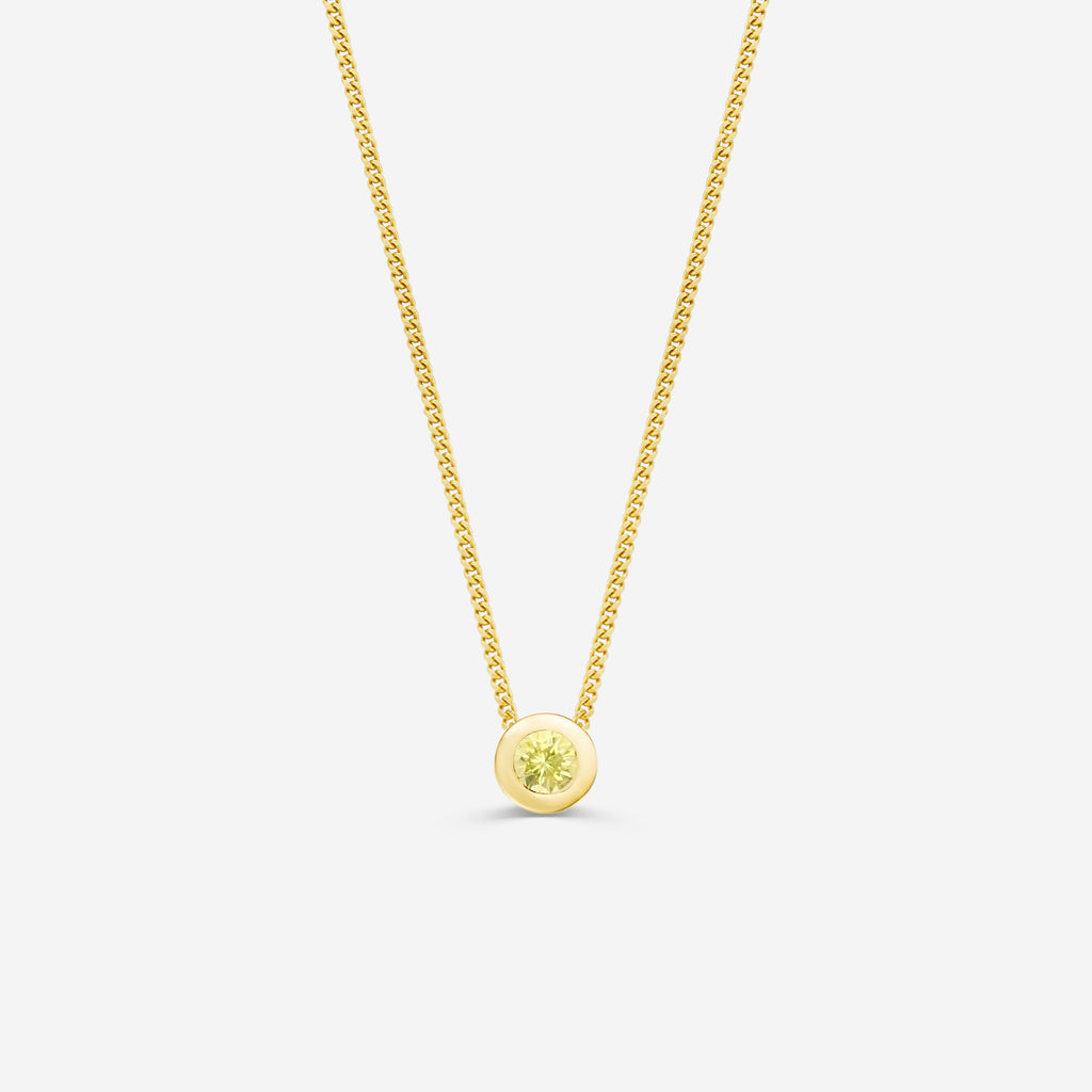9ct yellow gold necklace with a round citrine pendant on an off white background