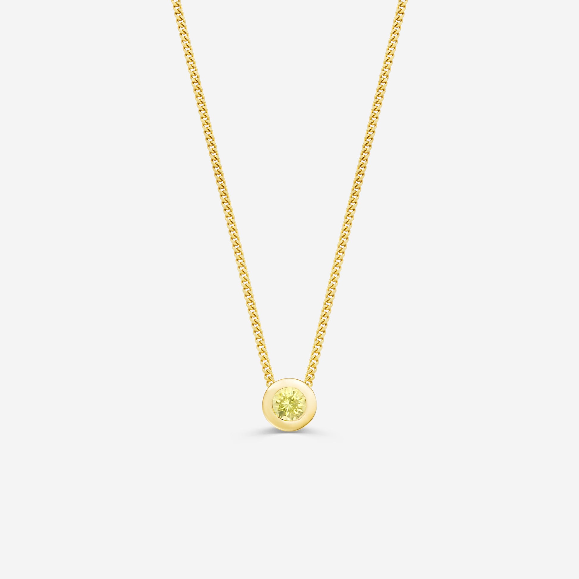 9ct yellow gold necklace with a round citrine pendant on an off white background