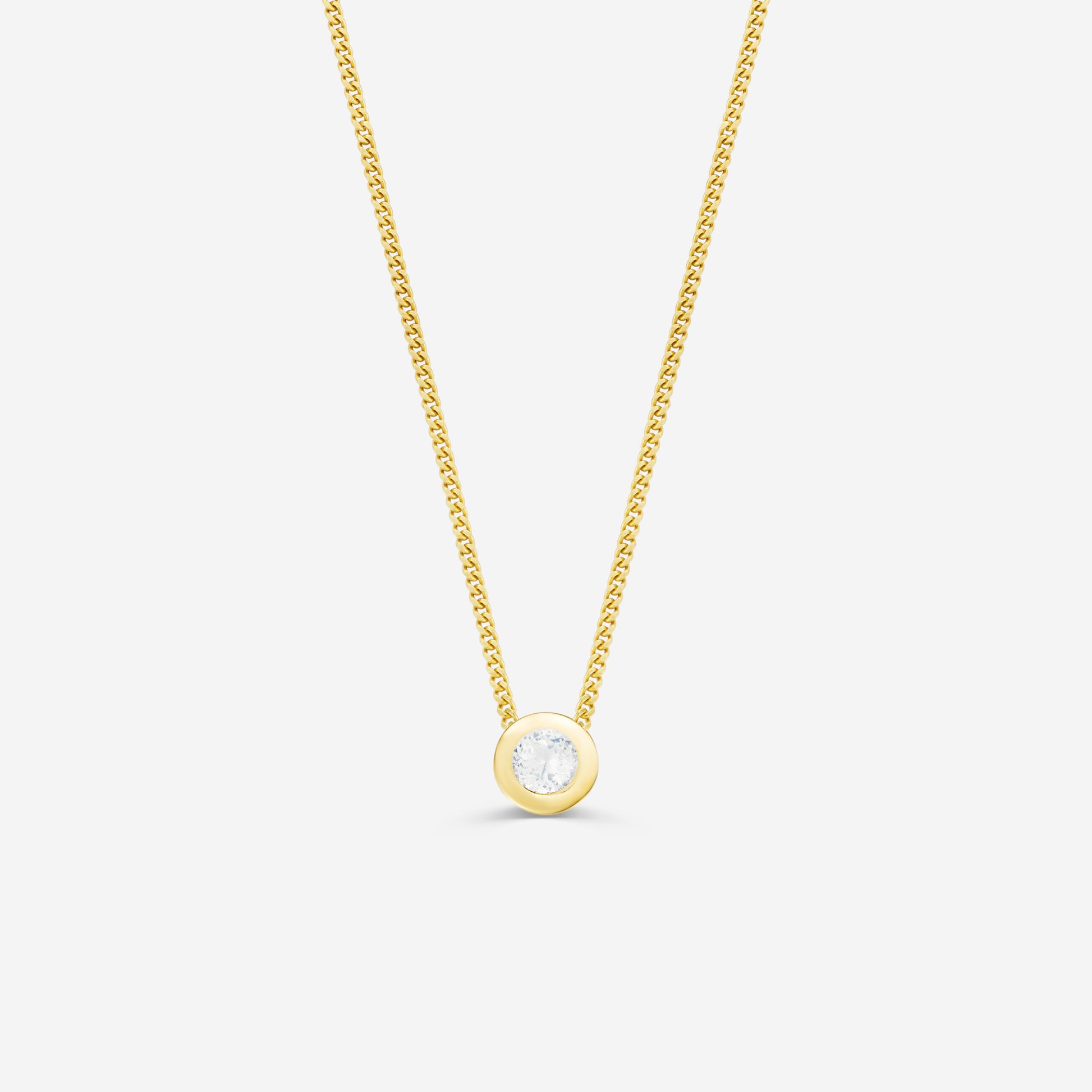 9ct yellow gold necklace with a round diamond pendant on an off white background