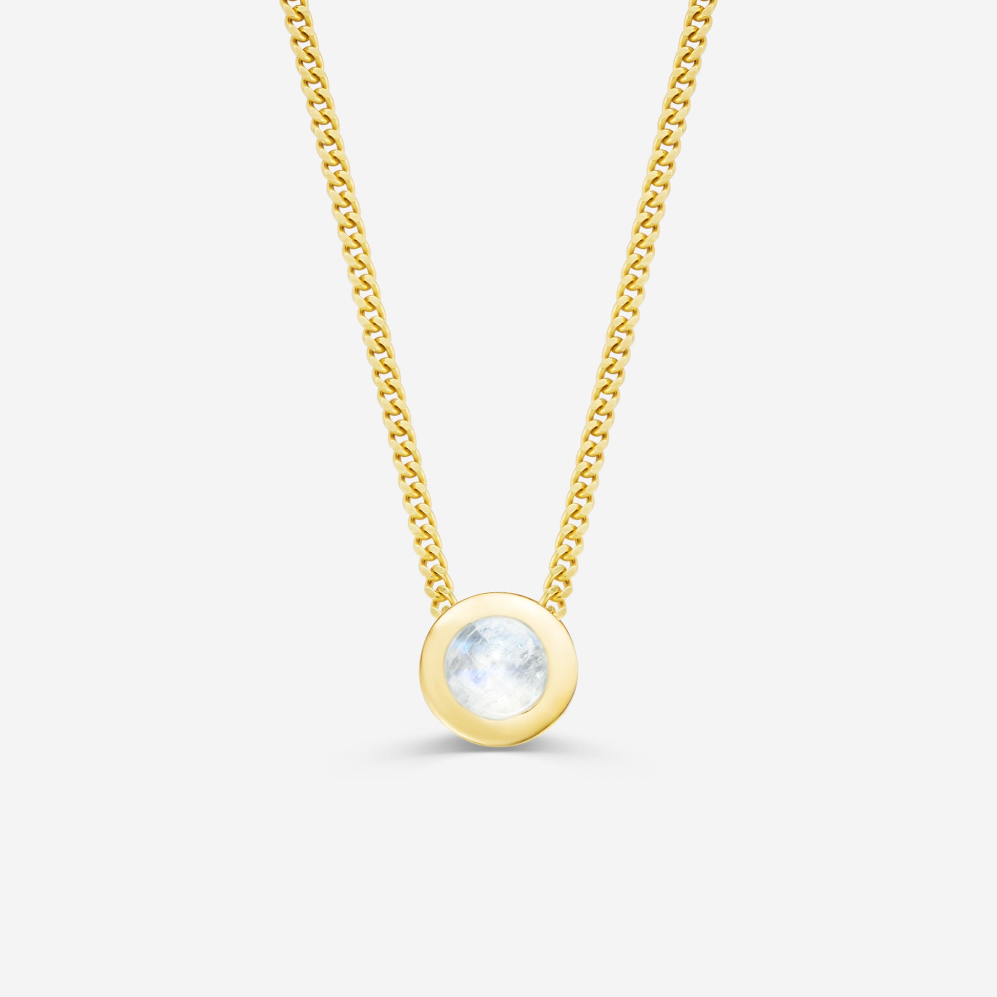 9ct yellow gold necklace with a round moonstone pendant on an off white background