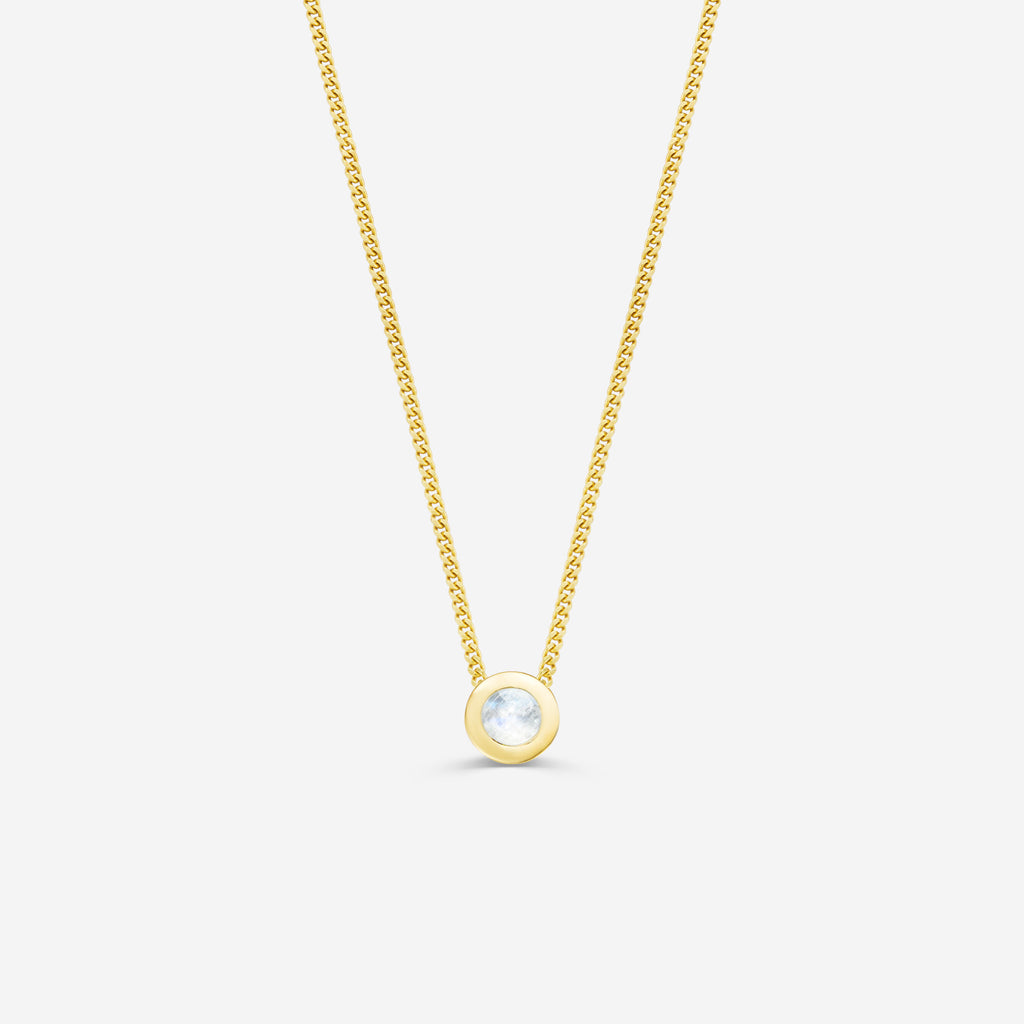 9ct yellow gold necklace with a round moonstone pendant on an off white background