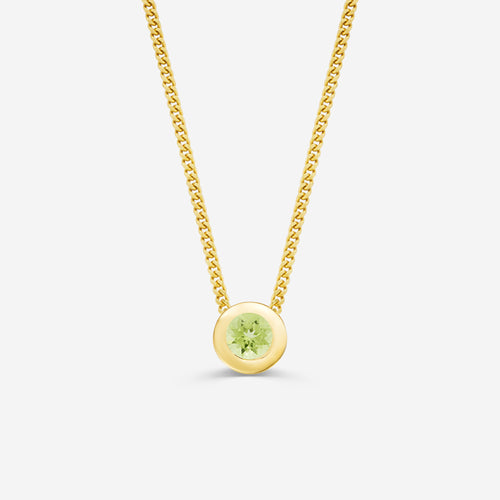 9ct yellow gold necklace with a round peridot pendant on an off white background