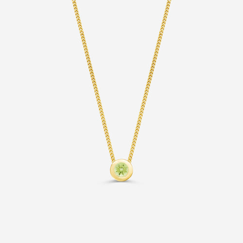 9ct yellow gold necklace with a round peridot pendant on an off white background