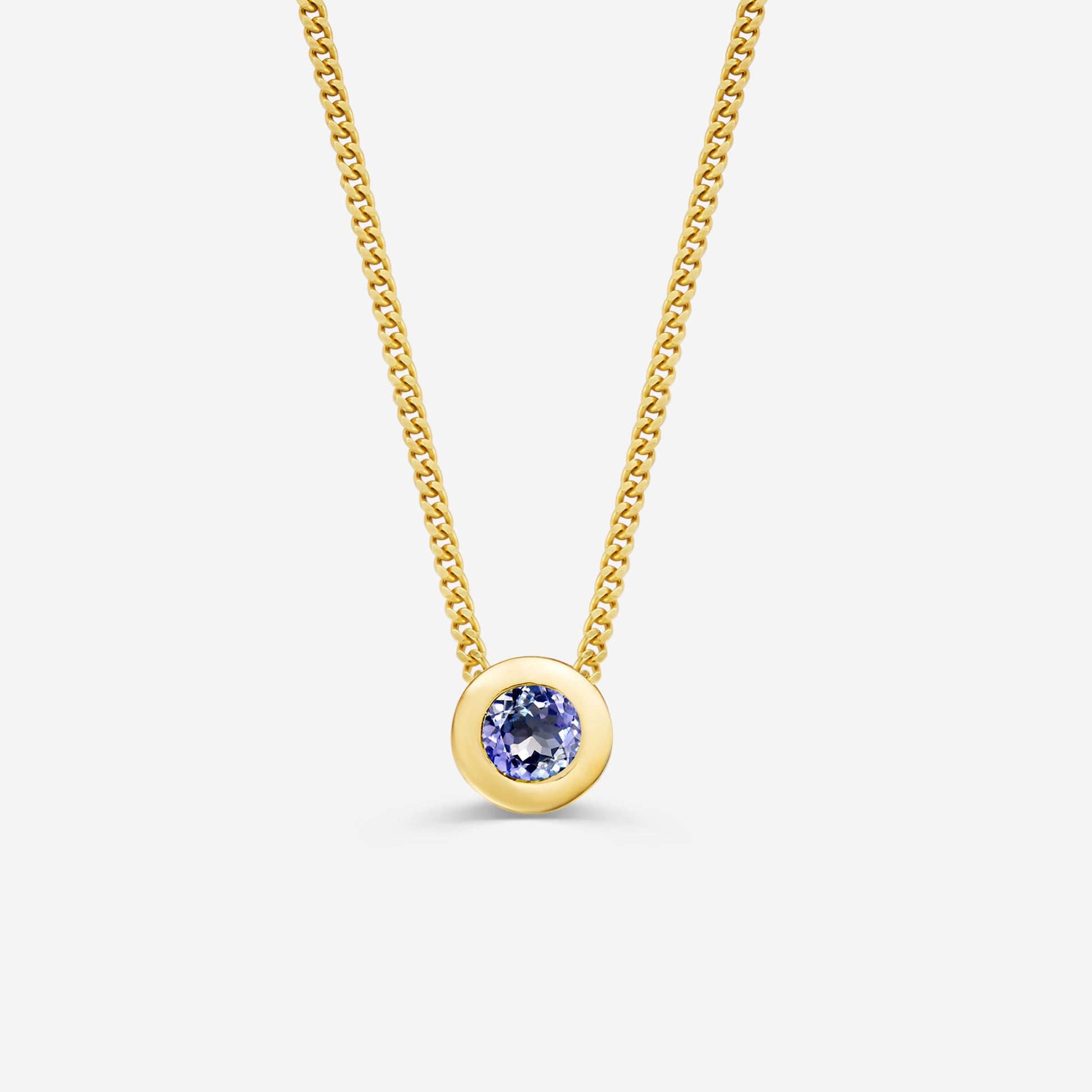 9ct yellow gold necklace with a round tanzantite pendant on an off white background