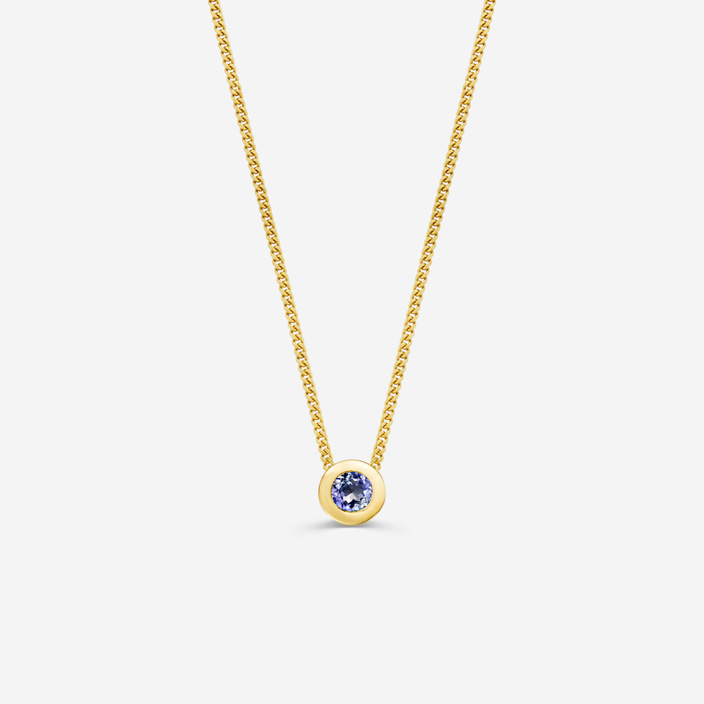 9ct yellow gold necklace with a round tanzantite pendant on an off white background