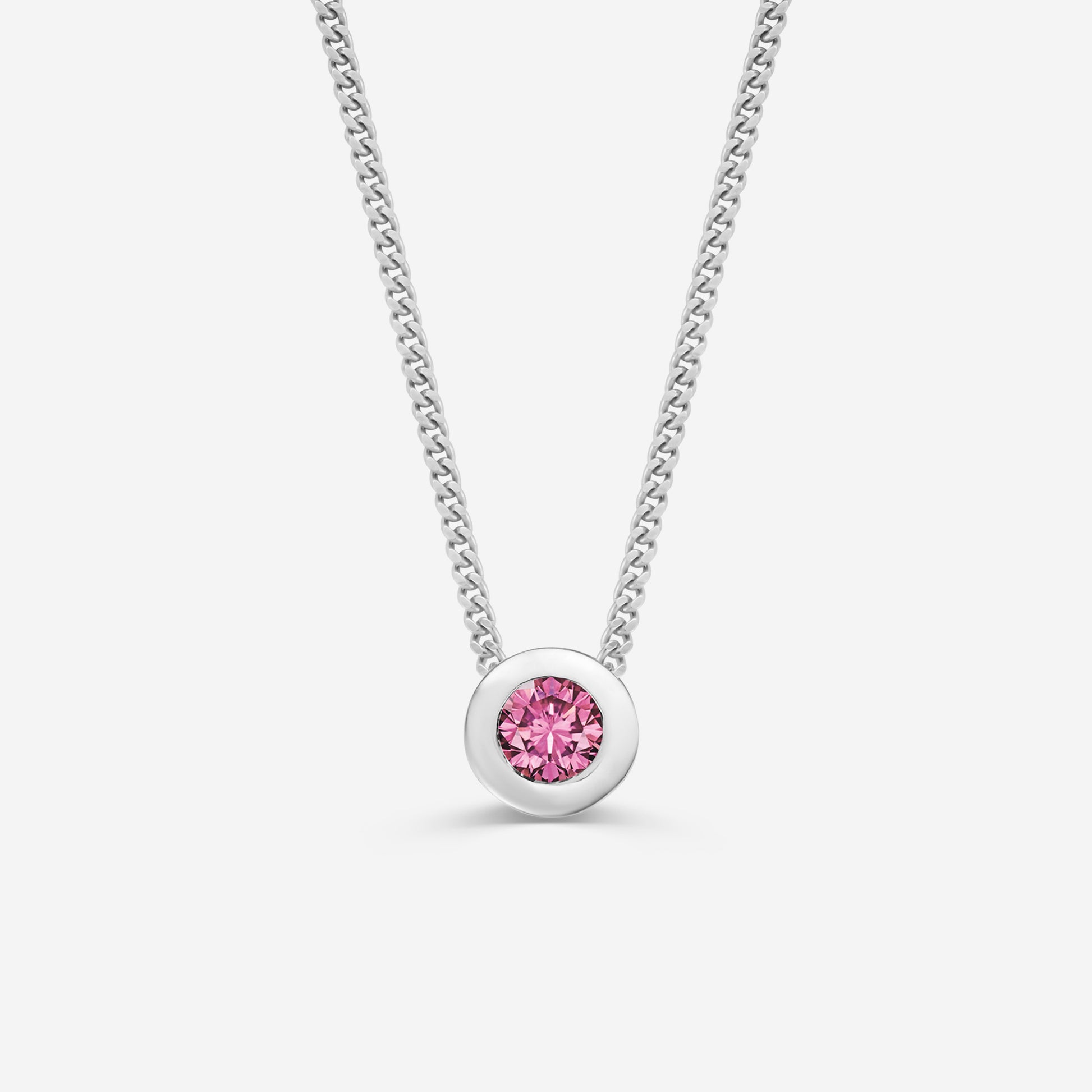 9ct white gold necklace with a round pink tourmaline pendant on an off white background