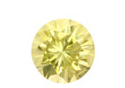 citrine round gemstone on a white background