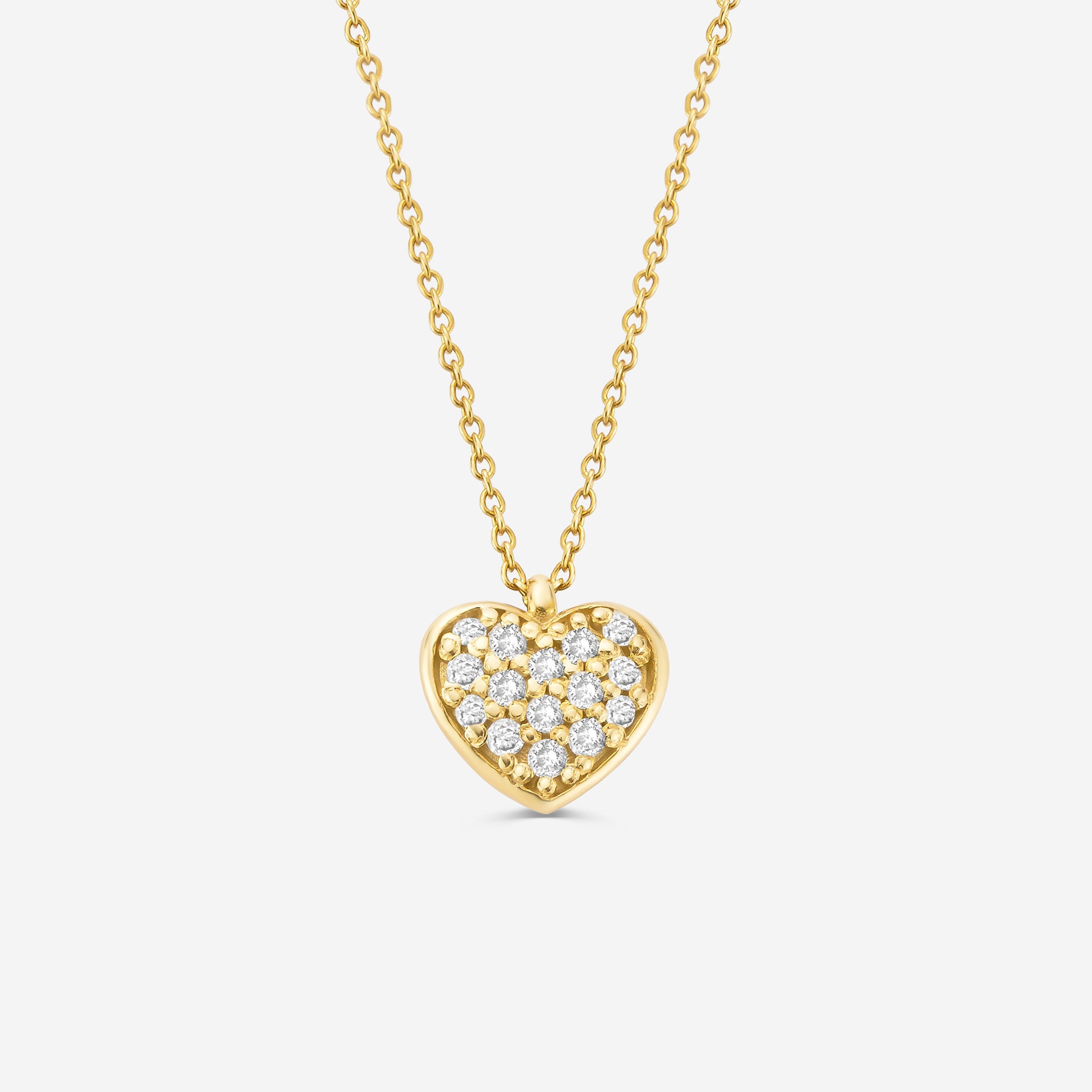 14ct gold necklace with a pave set diamond heart pendant on an off white background