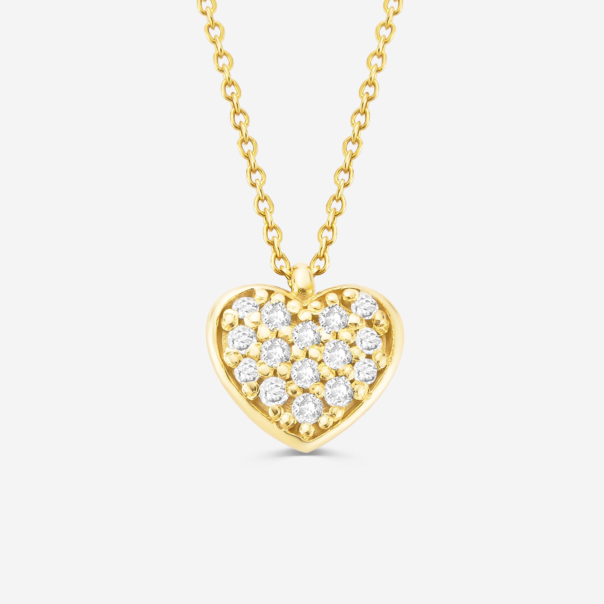 14ct gold necklace with a pave set diamond heart pendant on an off white background