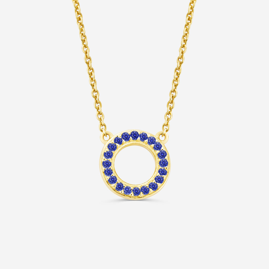 14ct yellow gold eternity necklace with a circular pendant featuring blue sapphire gemstones on an off white background