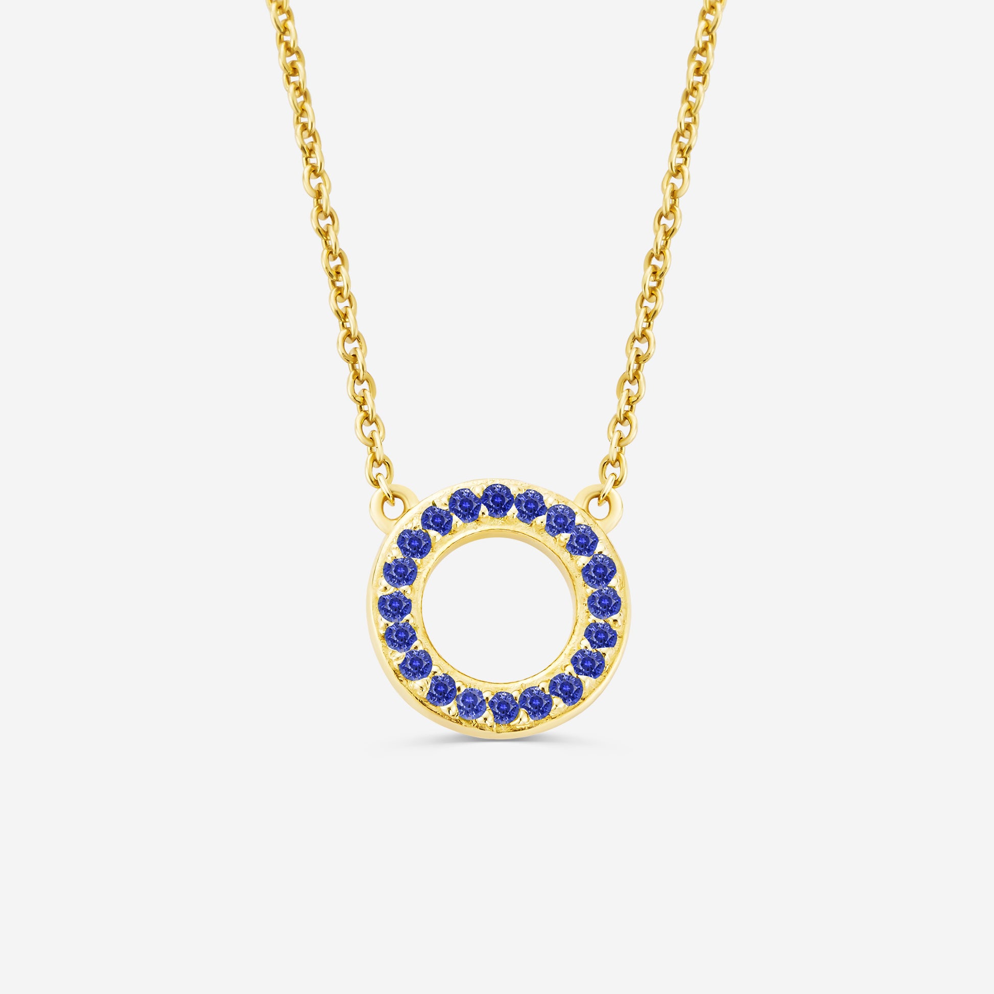 14ct yellow gold eternity necklace with a circular pendant featuring blue sapphire gemstones on an off white background